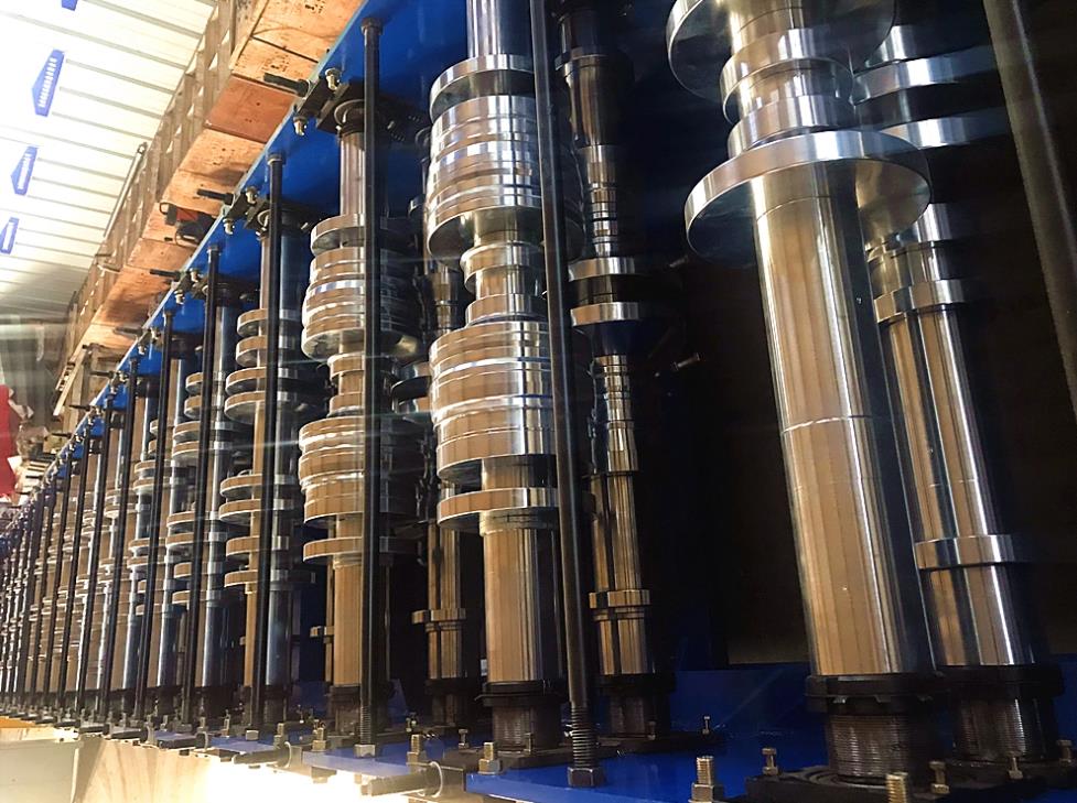 Steel deck floor roll forming machine